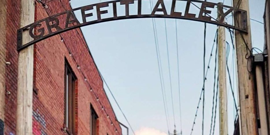 Custom metal arch sign for Florence, Alabama downtown.