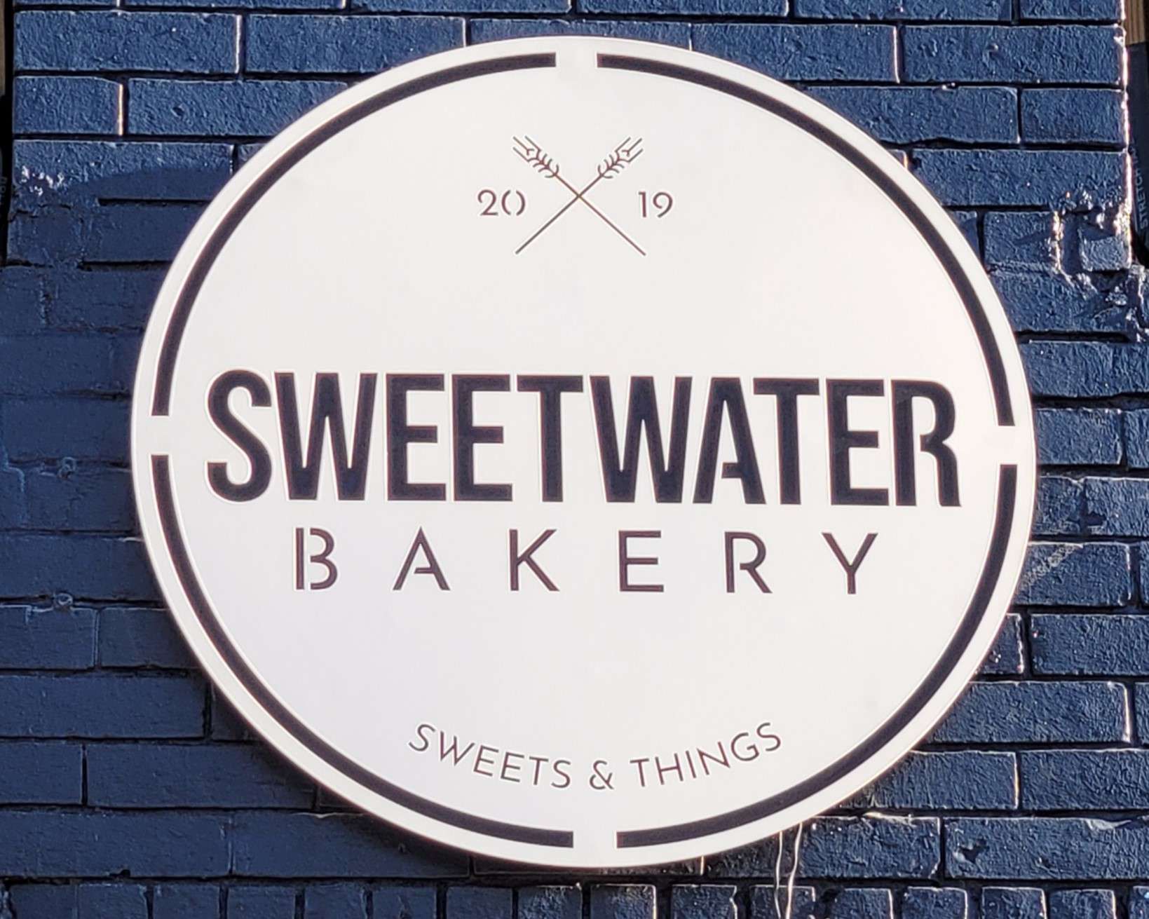 Custom metal round sign.