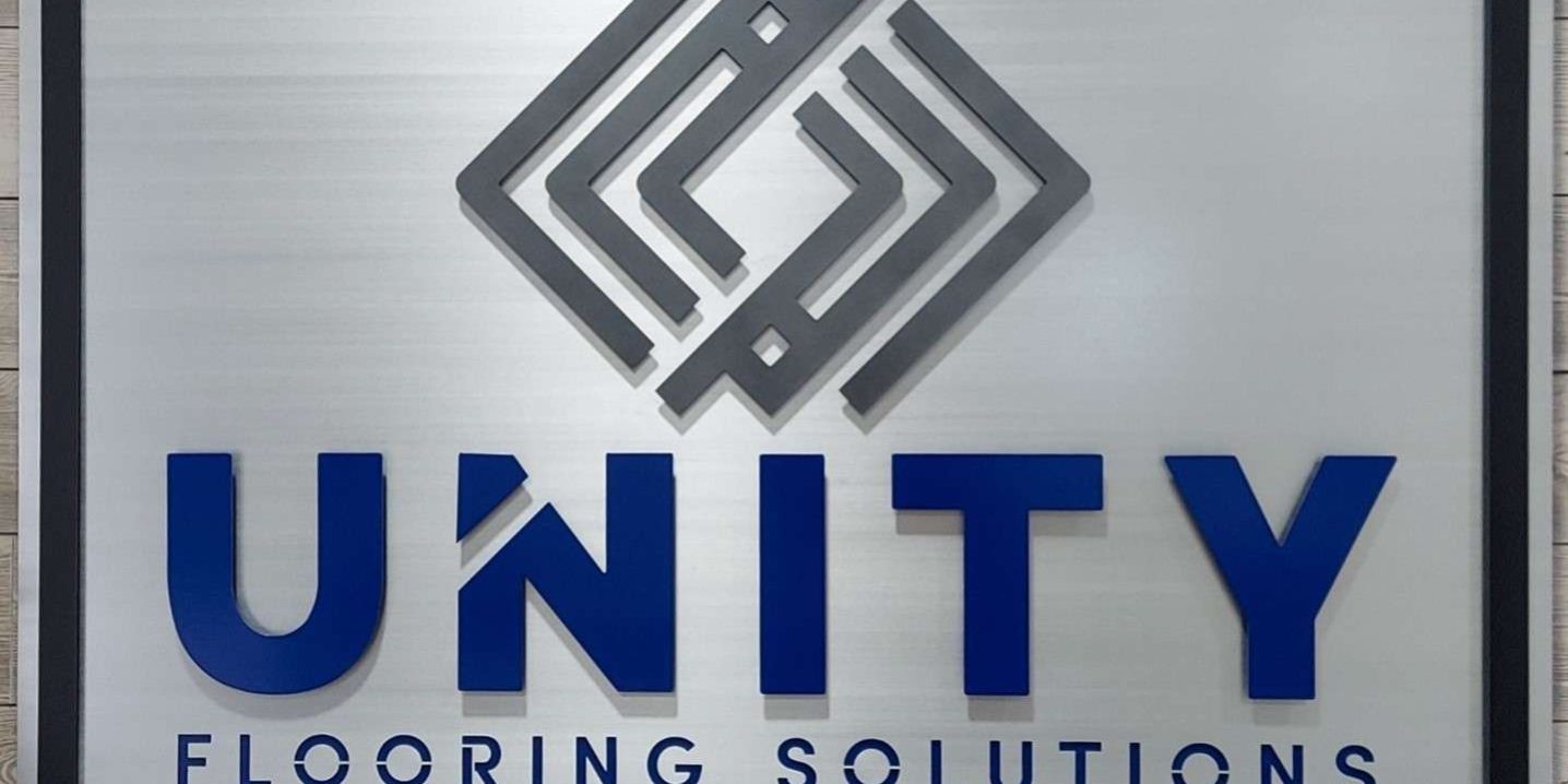 Custom metal layered logo sign.
