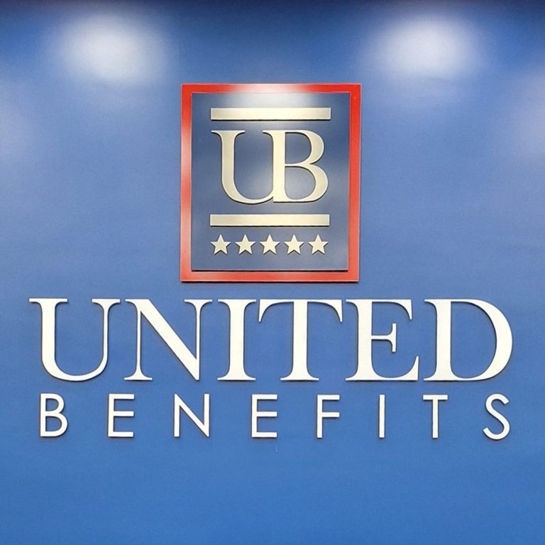 Custom logo metal sign as a feature wall in meeting room.