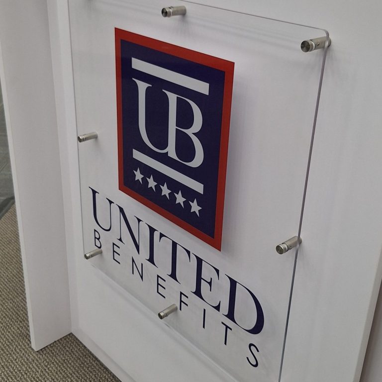 Full color printed acrylic sign with stand-off mounting.