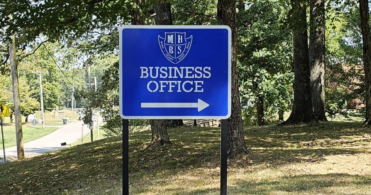 Custom metal directional sign for Mars Hill Bible School in Florence, Alabama.