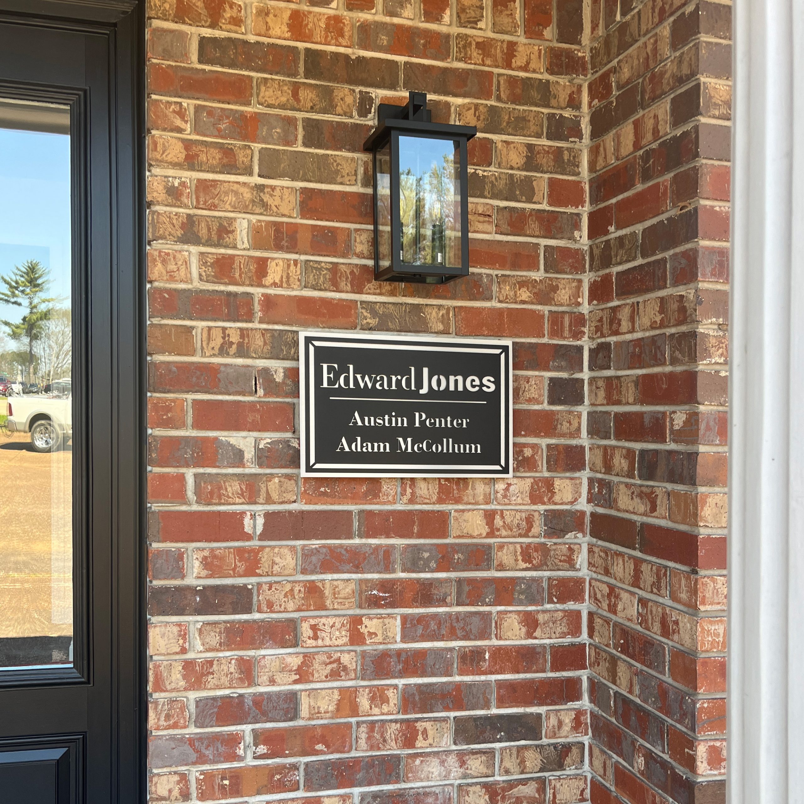 Exterior plaque name sign for entrance next to front door by Alabama Metal Art.