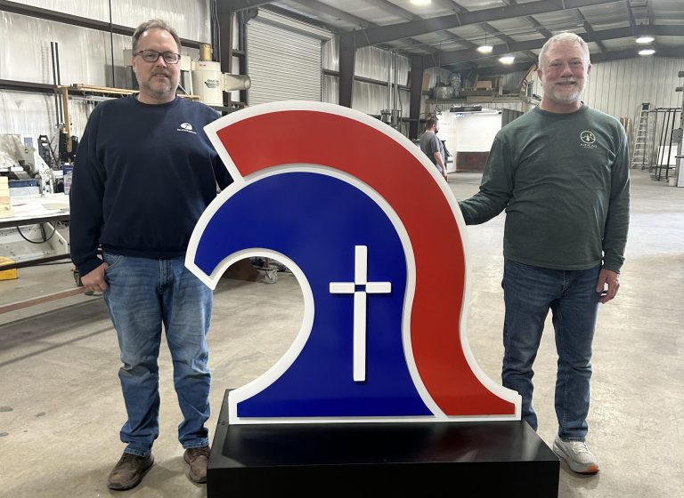 Mobile logo display for Trinity Christian Academy by Alabama Metal Art.