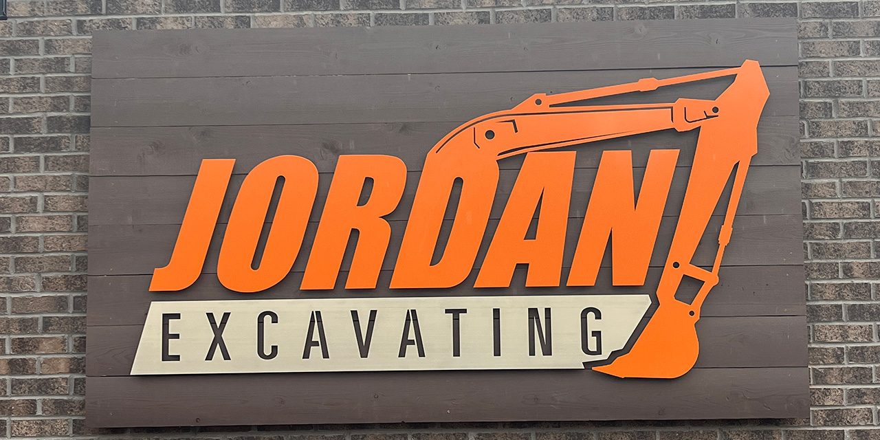 Custom metal exterior sign by Alabama Metal Art.