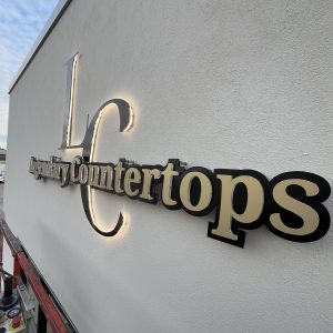 Custom backlit sign for Legendary Countertops by Alabama Metal Art.