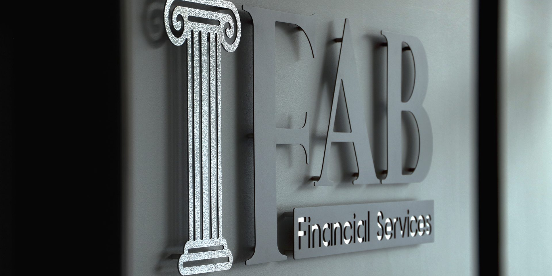 Custom metal logo sign for FAB Financial Services in Athens, AL by Alabama Metal Art.