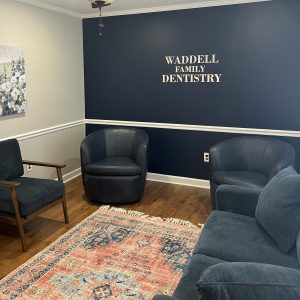 Custom metal lobby sign for Waddell Family Dentistry by Alabama Metal Art.